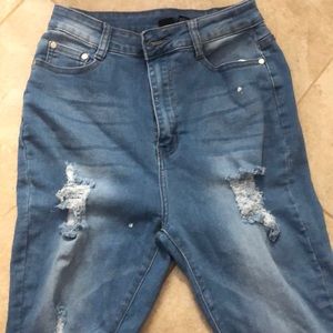 High waisted light blue jeans